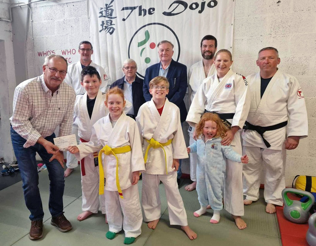W Bro Steve McGarvie, W Bro Gary Thomas and W Bro Trevor Byrant present a donation to Isla Maskell and other members of Neyland Judo Club